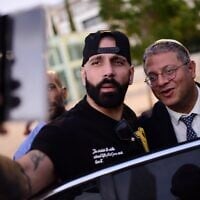 MK Itamar Ben Gvir and right-wing rapper and influencer Yoav Eliasi attend a protest in Tel Aviv, August 16, 2022. (Tomer Neuberg/ Flash90/ File)