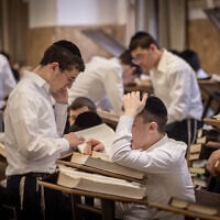 Ultra-Orthodox students studying at the Ponevezh Yeshiva in Bnei Brak, February 27, 2024. (Chaim Goldberg/Flash90)