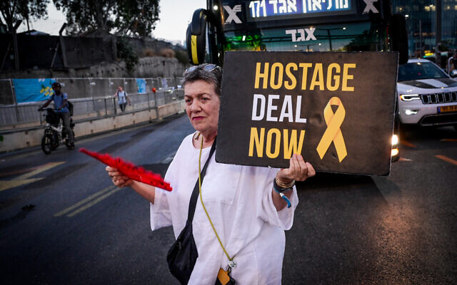 Demonstrators call for the release of Israeli hostages held in the Gaza Strip, outside Hakirya Base in Tel Aviv, July 3, 2024 (Avshalom Sassoni/Flash90) Demonstrators call for the release of Israeli hostages held in the Gaza Strip, outside Hakirya Base in Tel Aviv, July 3, 2024 (Avshalom Sassoni/Flash90)