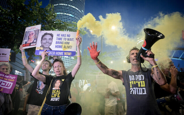 Demonstrators call for the release of Hamas hostages outside Tel Aviv's Defense Ministry compound on July 4, 2024. (Photo by Avshalom Sassoni/Flash90) Demonstrators call for the release of Hamas hostages outside Tel Aviv's Defense Ministry compound on July 4, 2024. (Photo by Avshalom Sassoni/Flash90)