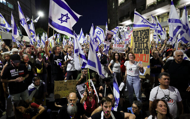 Anti-government protesters march to Prime Minister Benjamin Netanyahu's house in Jerusalem, July 4, 2024. (Yonatan Sindel/Flash90) Anti-government protesters march to Prime Minister Benjamin Netanyahu's house in Jerusalem, July 4, 2024. (Yonatan Sindel/Flash90)