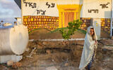 Jews attend a special prayer at the newly recognized Evyatar outpost, in the West Bank, July 7, 2024. (Chaim Goldberg/ Flash90)