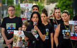 Einav Zanguaker speaks during a press conference of relatives of hostages held by Hamas in Gaza, outside the Kirya IDF headquarters in Tel Aviv, July 27, 2024. (Avshalom Sassoni/Flash90)