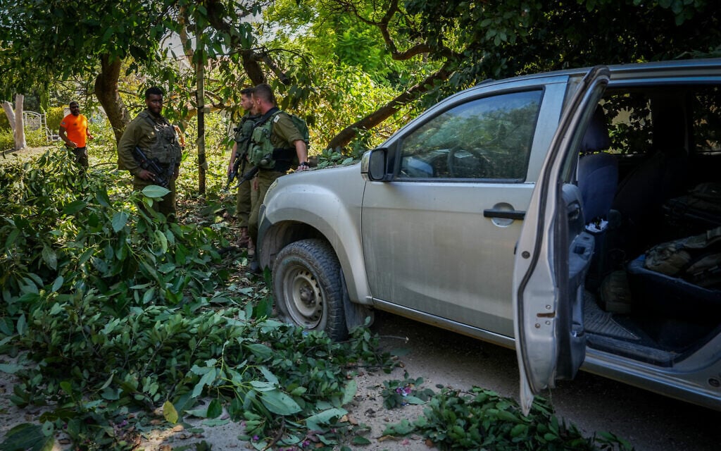 Israeli security forces at the scene of a Hezbollah rocket attack that killed Nir Popko at Kibbutz HaGoshrim, July 30, 2024. (Ayal Margolin/Flash90)