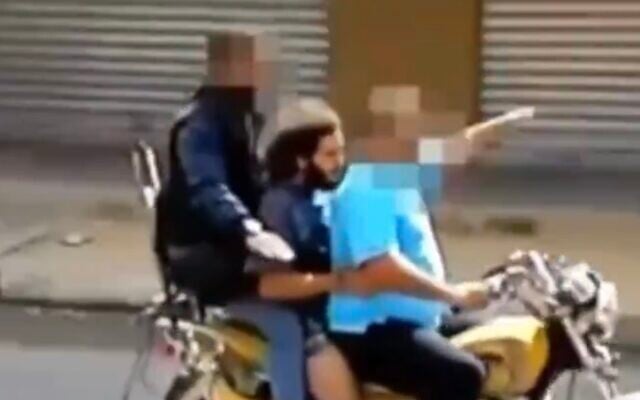 A screenshot of an undated video clip published on July 23, 2024, shows hostage Matan Zangauker being transported by Palestinian terrorists in the Gaza Strip following the Hamas-led October 7 attack on southern Israel. (X video screenshot: used in accordance with Clause 27a of the Copyright Law) A screenshot of an undated video clip published on July 23, 2024, shows hostage Matan Zangauker being transported by Palestinian terrorists in the Gaza Strip following the Hamas-led October 7 attack on southern Israel. (X video screenshot: used in accordance with Clause 27a of the Copyright Law)