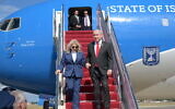 Prime Minister Benjamin Netanyahu, right, and his wife Sara exit the official Wing of Zion plane in Washington, DC, on July 22, 2024. (Amos Ben Gershom / GPO)