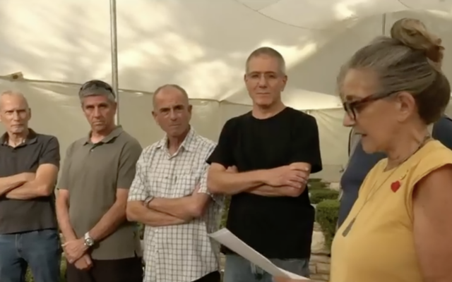 Friends attend an alternative memorial ceremony for Prime Minister Benjamin Netanyahu's older brother Yoni, who was killed 48 years ago in Operation Entebbe, at the Mount Herzl military cemetery, July 4, 2024. (Screenshot, used in accordance with Clause 27a of the Copyright Law) Friends attend an alternative memorial ceremony for Prime Minister Benjamin Netanyahu's older brother Yoni, who was killed 48 years ago in Operation Entebbe, at the Mount Herzl military cemetery, July 4, 2024. (Screenshot, used in accordance with Clause 27a of the Copyright Law)