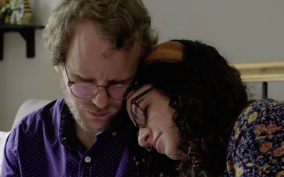 Gabe and Liz Rutan-Ram in a still from a campaign ad from Americans United for the Separation of Church and State. (YouTube)