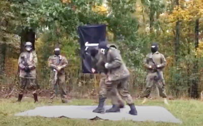 Members of the neo-Nazi group "The Base" are seen training in an undated propaganda video. (Youtube screenshot)