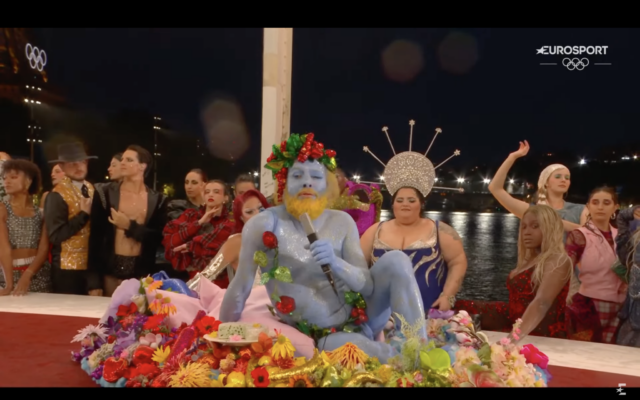 French performers are seen riffing on Leonardo Da Vinci's painting of the Last Supper, in this screen capture from the opening of the 2024 Summer Olympics in Paris. (Screen capture via YouTube, used in accordance with Clause 27a of the Copyright Law) French performers are seen riffing on Leonardo Da Vinci's painting of the Last Supper, in this screen capture from the opening of the 2024 Summer Olympics in Paris. (Screen capture via YouTube, used in accordance with Clause 27a of the Copyright Law)