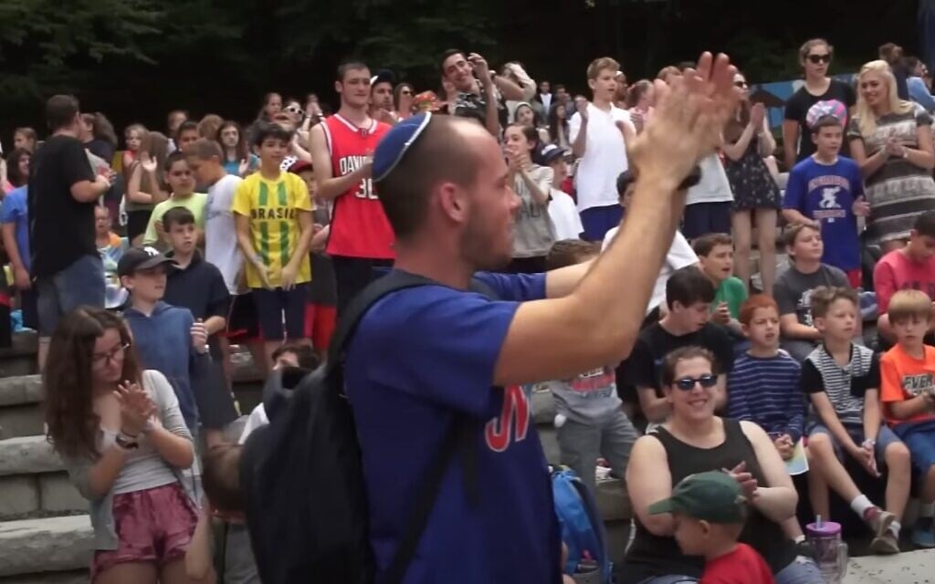 Campers at Surprise Lake Camp in North Highlands, upstate New York, in a 2016 promotional video (Screen capture: Youtube/Surprise Lake Camp; used in accordance with Clause 27a of the Copyright Law) Campers at Surprise Lake Camp in North Highlands, upstate New York, in a 2016 promotional video (Screen capture: Youtube/Surprise Lake Camp; used in accordance with Clause 27a of the Copyright Law)
