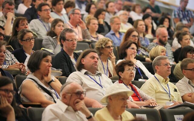 Illustrative. Attendees at a Yad Vashem conference. (courtesy)