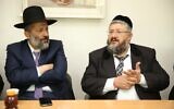 Shas leader Aryeh Deri (L) listens to his brother Beersheba's late chief rabbi Yehuda Deri. (Yaakov Cohen)