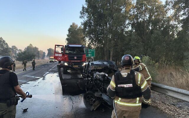 Firefighters are seen at the scene of a rocket impact near the Nafah Junction in the Golan Heights, July 9, 2024. (Fire and Rescue Services) Firefighters are seen at the scene of a rocket impact near the Nafah Junction in the Golan Heights, July 9, 2024. (Fire and Rescue Services)