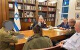 Prime Minister Benjamin Netanyahu at the Kirya military headquarters in Tel Aviv, with his chief of staff Tzachi Braverman, his military secretary Maj. Gen. Roman Gofman and National Security Adviser Tzachi Hanegbi, in a photo released soon after an Israeli strike on a Hezbollah target in Beirut, July 30, 2024 (PMO)