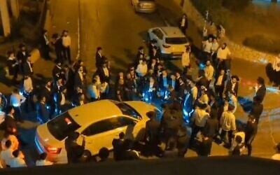 Screen capture from a video on social media showing an attack on two senior IDF officers by Haredi rioters in Bnei Brak, July 15, 2024. (Used in accordance with Clause 27a of the Copyright Law)