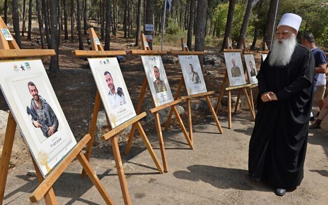 A ceremony for fallen Druze soldiers in the Ahihud forest, July 2, 2024. (Guy Assayag/ KKL-JNF)