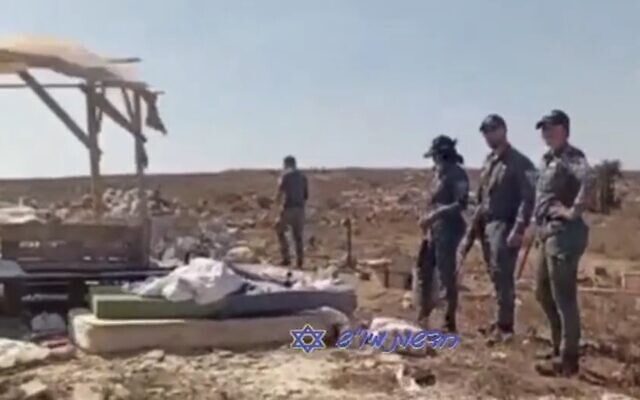 Border Police officers seen at the site of the illegal Tzur Harel outpost on July 7, 2024, in this screenshot from video. (Screenshot used in accordance with clause 27a of the copyright law) Border Police officers seen at the site of the illegal Tzur Harel outpost on July 7, 2024, in this screenshot from video. (Screenshot used in accordance with clause 27a of the copyright law)