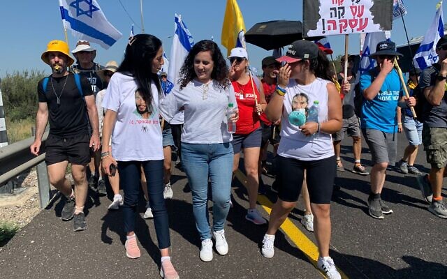 Labor MK Naama Lazimi joins in hostages families' four-day march from Tel Aviv to Jerusalem calling for a hostage deal and end to war on July 11, 2024. (Charlie Summers/Times of Israel) Labor MK Naama Lazimi joins in hostages families' four-day march from Tel Aviv to Jerusalem calling for a hostage deal and end to war on July 11, 2024. (Charlie Summers/Times of Israel)