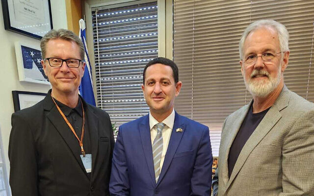 Tim Griffin of Grand Canyon University, left, and Passages' chief advancement officer Paul Weder, right, meet Religious Zionism MK Ohad Tal in the Knesset in Jerusalem on July 18, 2024. (Passages) Tim Griffin of Grand Canyon University, left, and Passages' chief advancement officer Paul Weder, right, meet Religious Zionism MK Ohad Tal in the Knesset in Jerusalem on July 18, 2024. (Passages)