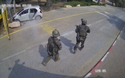 Troops of the elite Shaldag unit fight Hamas terrorists at the entrance to Kibbutz Be'eri on October 7, 2023. (Screen capture/Israel Defense Forces) Troops of the elite Shaldag unit fight Hamas terrorists at the entrance to Kibbutz Be'eri on October 7, 2023. (Screen capture/Israel Defense Forces)