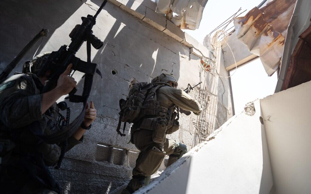 IDF troops seen operating in the Gaza Strip in this handout photo published on August 20, 2024. (Israel Defense Forces)
