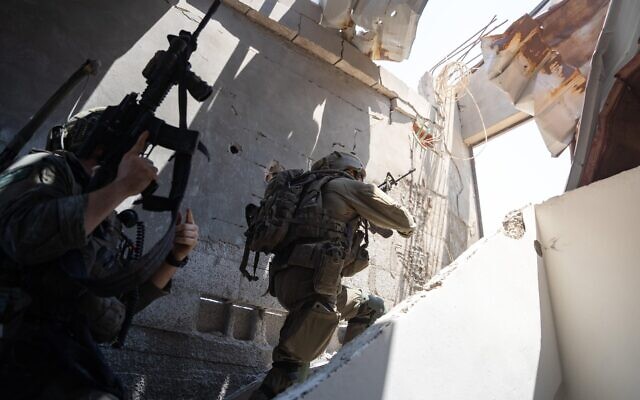IDF troops seen operating in the Gaza Strip in this handout photo published on August 20, 2024. (Israel Defense Forces)
