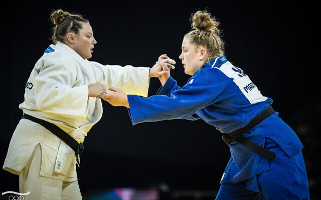 Israeli judoka Raz Hershko (white) competes against Marit Kamps of the Netherlands in the round of 16 women's over-78kg weight class at the 2024 Paris Olympics, August 2, 2024. (Olympic Committee of Israel) Israeli judoka Raz Hershko (white) competes against Marit Kamps of the Netherlands in the round of 16 women's over-78kg weight class at the 2024 Paris Olympics, August 2, 2024. (Olympic Committee of Israel)