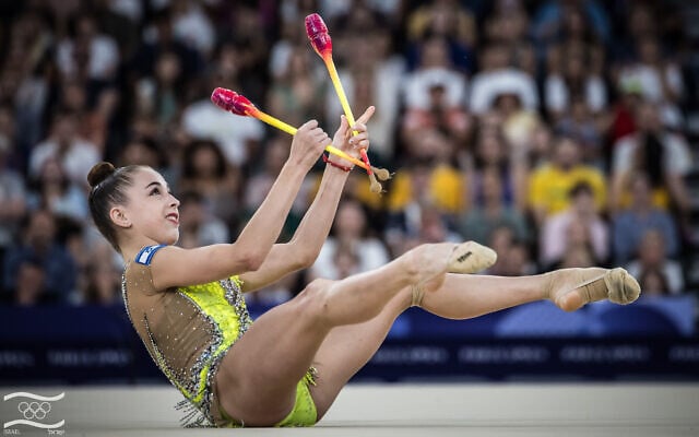 Israel's Daria Atamanov performs with the clubs in the rhythmic gymnastics' individual all-around final at the Paris 2024 Olympics, August 9, 2024. (Olympic Committee of Israel) Israel's Daria Atamanov performs with the clubs in the rhythmic gymnastics' individual all-around final at the Paris 2024 Olympics, August 9, 2024. (Olympic Committee of Israel)