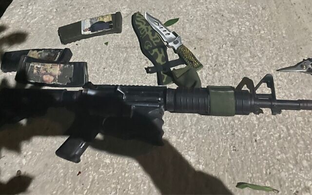 Weapons found in the car of a Palestinian terrorist who carried out a shooting attack in the West Bank city of Qalqilya on August 12, 2024. (Israel Defense Forces)