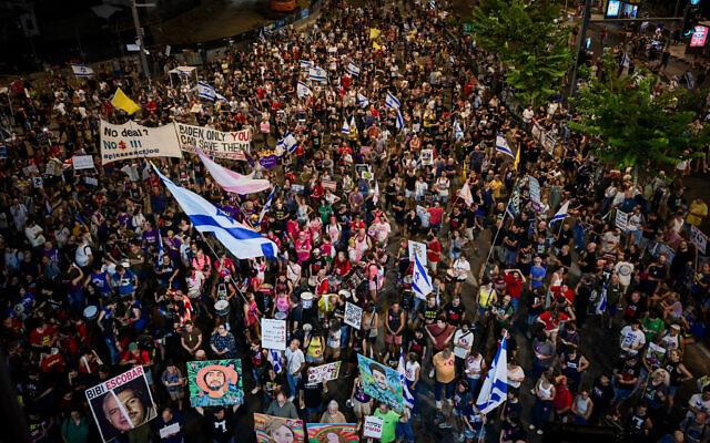 Protesters call for the release of hostages held by Hamas in the Gaza Strip outside the Kirya Base in Tel Aviv, August 24, 2024. (Avshalom Sassoni/Flash90) Protesters call for the release of hostages held by Hamas in the Gaza Strip outside the Kirya Base in Tel Aviv, August 24, 2024. (Avshalom Sassoni/Flash90)