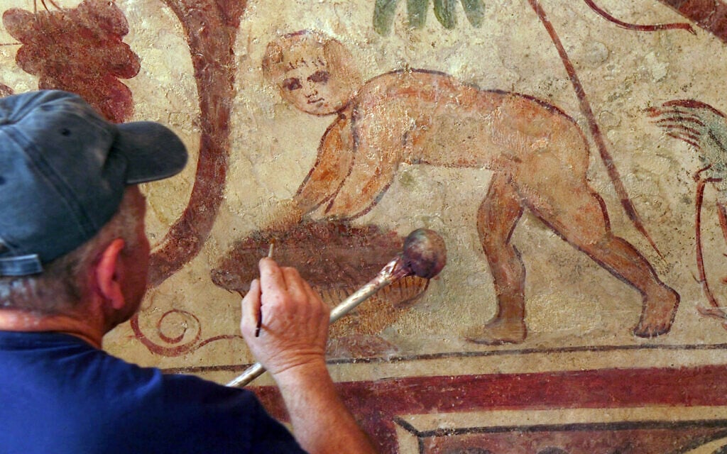 Restoration work on the Roman tombs in Ashkelon, in an image released on August 27, 2023. (Emil Aladjem, IAA)