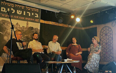 Yisrael Neta (left), Elhanan Nir, Meron Isaacson, Bacol Serlui and Sivan Har-Shefi at the Metula Poetry Festival relocated to Jerusalem, August 28-30, 2024. (Jessica Steinberg/Times of Israel)