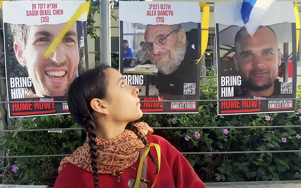 Talya Dancyg, granddaughter of hostage Alex Dancyg who was murdered in Hamas captivity, in the video of her song, 'Dragon of War,' which she'll perform at the Israel Festival in September 2024 (screen capture: YouTube, used in accordance with Clause 27a of the Copyright Law) Talya Dancyg, granddaughter of hostage Alex Dancyg who was murdered in Hamas captivity, in the video of her song, 'Dragon of War,' which she'll perform at the Israel Festival in September 2024 (screen capture: YouTube, used in accordance with Clause 27a of the Copyright Law)