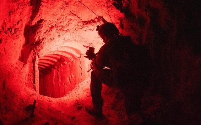 Troops investigate a Hamas attack tunnel in southern Gaza's Rafah, in a handout photo issued on August 23, 2024. (Israel Defense Forces)