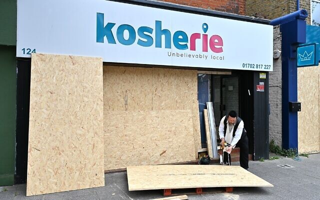 The Kosherie, a kosher food shop, is boarded up in preparation for more unrest in Westcliff-on-Sea, England, August 7, 2024. (John Keeble/Getty Images via JTA)