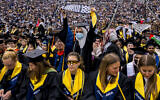 A student holds a keffiyeh at the beginning of a pro-Palestinian protest during the University of Michigan's Spring Commencement ceremony on May 4, 2024 at Michigan Stadium in Ann Arbor, Michigan. (Nic Antaya / GETTY IMAGES NORTH AMERICA / Getty Images via AFP)