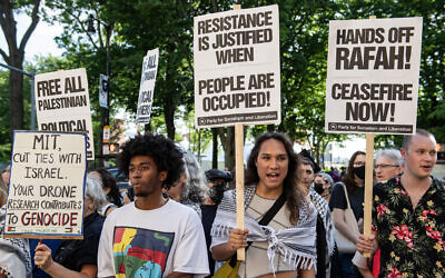 Anti-Israel protesters chant holding signs at a rally in front of the Massachusetts Institute of Technology (MIT) in Cambridge, Massachusetts, on May 28, 2024. (Joseph Prezioso/AFP)
