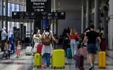 Passengers depart from Rafic Hariri International Airport as many flights are delayed or canceled in Beirut on July 29, 2024. (Anwar AMRO / AFP)