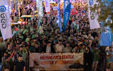 Pro-Hamas demonstrators take part in a rally to protest the killing of the Hamas terror group's leader Ismail Haniyeh, following evening prayers in Fatih district of Istanbul on July 31, 2024. (Kemal Aslan/AFP)