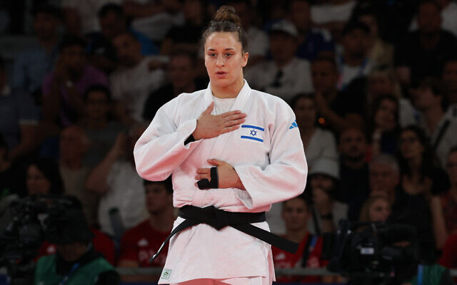 Israel's Inbar Lanir reacts after beating Netherlands' Guusje Steenhuis in the judo women's -78kg quarterfinal bout of the Paris 2024 Olympic Games, August 1, 2024. (Jack Guez/AFP) Israel's Inbar Lanir reacts after beating Netherlands' Guusje Steenhuis in the judo women's -78kg quarterfinal bout of the Paris 2024 Olympic Games, August 1, 2024. (Jack Guez/AFP)