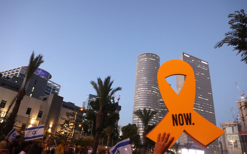 Supporters and relatives of Israelis held hostage by terror groups in the Gaza Strip since October 7, demonstrate to demand their release 300 days since their abduction, in Tel Aviv on August 1, 2024. (Gil Cohen-Magen/AFP)