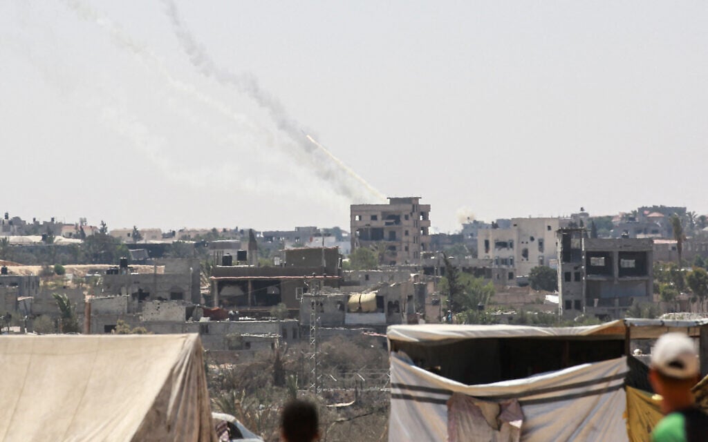 Rockets are fired from Khan Younis in the southern Gaza Strip toward Israel on August 5, 2024. (Bashar Taleb/AFP) Rockets are fired from Khan Younis in the southern Gaza Strip toward Israel on August 5, 2024. (Bashar Taleb/AFP)