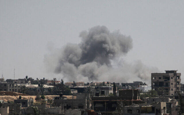 Smoke from an Israeli bombardment billows from Khan Younis in the southern Gaza Strip on August 5, 2024. (Bashar Taleb/AFP)