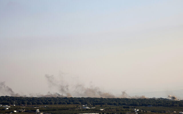 Smoke billows over hills in the Golan Heights after rockets were fired from southern Lebanon on August 6, 2024. (Jalaa MAREY / AFP)