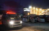 Ambulances donated to Nasser hospital by the humanitarian organization Rahma Worldwide, are parked outside the medical facility in Khan Younis in the southern Gaza Strip after entering the Palestinian territory from Egypt via the Karem Shalom gate, on August 7, 2024 (Bashar TALEB / AFP)