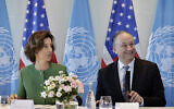 UNESCO Director-General Audrey Azoulay (L) and US Second Gentleman Doug Emhoff attend a meeting dedicated to combating antisemitism through education, at the UNESCO headquarters in Paris on August 8, 2024. (STEPHANE DE SAKUTIN / AFP)