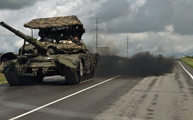 A Russian battle tank T-72 drives outside the town of Sudzha on August 8, 2024. (Anatoliy Zhdanov/Kommersant Photo/AFP) A Russian battle tank T-72 drives outside the town of Sudzha on August 8, 2024. (Anatoliy Zhdanov/Kommersant Photo/AFP)