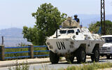 An armoured vehicle of the United Nations Interim Force in Lebanon (UNIFIL) patrols the southern Lebanese border area of Marjayoun on August 8, 2024. (Photo by AFP)