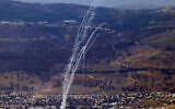 Rockets fired from southern Lebanon are intercepted by Israel's Iron Dome air defense system over the Upper Galilee region in northern Israel on August 9, 2024. (Jalaa Marey/AFP)
